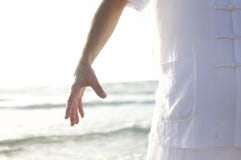 Person in White Shirt Standing on Seashore during Daytime Royalty Free Stock Photography Person in White Shirt Standing on Seashore during Daytime Royalty Free Stock Photography