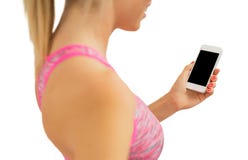 Personne sportive et sportive à l'aide du smartphone image libre de droits Personne sportive et sportive à l'aide du smartphone image libre de droits