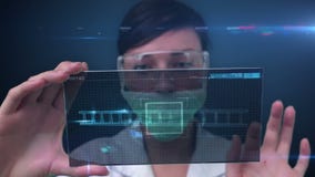 Pesquisador que usa a tecnologia vídeos de arquivo Pesquisador que usa a tecnologia vídeos de arquivo