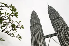 PETRONAS Twin Towers Under A Cloudy Sky Stock Photography