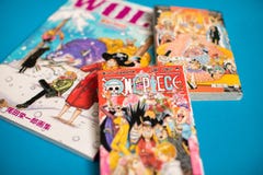 Pezzo giapponese di Manga One - libro di fumetti pubblicato in rivista settimanale di salto di Shonen fotografie stock libere da diritti Pezzo giapponese di Manga One - libro di fumetti pubblicato in rivista settimanale di salto di Shonen fotografie stock libere da diritti