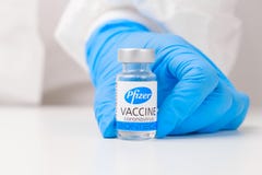 Pfizer vaccine against Covid-19, coronavirus or SARS-Cov-2 in doctor hand in rubber gloves, March 2021, San Francisco