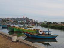 Fishing boats moored on the Ca Tai river in Phan Thiet, Vietnam royalty free stock photos Fishing boats moored on the Ca Tai river in Phan Thiet, Vietnam royalty free stock photos