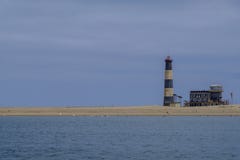 Phare Namibie de point de pélican sur la droite photos libres de droits Phare Namibie de point de pélican sur la droite photos libres de droits