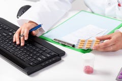 Pharmacist during work in pharmacy stock photography Pharmacist during work in pharmacy stock photography