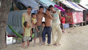 PHNOM PENH SLUMS - JUNE 2012: Friendship in slum