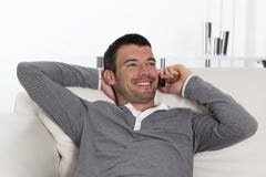 Phone on sofa stock photo Phone on sofa stock photo