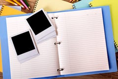 Photo album open with several blank polaroid style photo print frames stock photos Photo album open with several blank polaroid style photo print frames stock photos