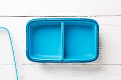 Photo of blue lunchbox with lid