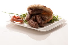 Photo of Cevapi, cevapcici, traditional Balkan food - delicious stock photos Photo of Cevapi, cevapcici, traditional Balkan food - delicious stock photos