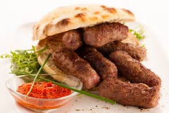 Photo of Cevapi, cevapcici, traditional Balkan food - delicius stock photo Photo of Cevapi, cevapcici, traditional Balkan food - delicius stock photo