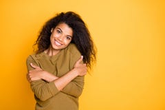 Photo Of Curly Wavy Cheerful Nice Charming Positive Girlfriend Hugging Herself Smiling Beaming With Self Love Isolated Royalty Free Stock Images
