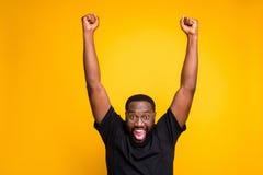 Photo Of Excited Overjoyed Rejoicing Man Expressing Crazy Emotions On Face In Eye Glasses Raising His Fists Up After Stock Photography