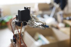 Photo of robot manipulator, which holds the chip stock photo Photo of robot manipulator, which holds the chip stock photo