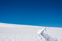 A snow covered mountain slope and amazing blue sky royalty free stock photos A snow covered mountain slope and amazing blue sky royalty free stock photos