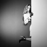 Photo young beautiful woman in a raincoat in interior royalty free stock photos Photo young beautiful woman in a raincoat in interior royalty free stock photos