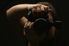 Photographer With Camera Stock Photo