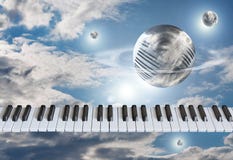 Piano keys, the keyboard in the sky with clouds around the globe royalty free stock photography Piano keys, the keyboard in the sky with clouds around the globe royalty free stock photography