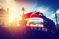 Piccadilly Circus neon ads glow at sunset, young night. London, UK. royalty free stock photography Piccadilly Circus neon ads glow at sunset, young night. London, UK. royalty free stock photography