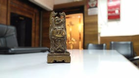 Piccola condizione felice di Buddha immagine stock Piccola condizione felice di Buddha immagine stock