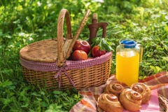 Picnic basket with wine fruit and other products on a natural wooden background. Summer rest . Camping. Picnic in nature stock photos Picnic basket with wine fruit and other products on a natural wooden background. Summer rest . Camping. Picnic in nature stock photos