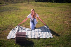 https://thumbs.dreamstime.com/t/picnic-pleasure-full-length-portrait-lovely-young-fair-haired-woman-wearing-white-t-shirt-jeans-spreading-out-47021266.jpg