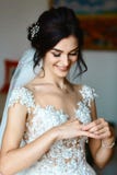 Picture of bride looking at wedding ring. Authentic lifestyle image royalty free stock photo Picture of bride looking at wedding ring. Authentic lifestyle image royalty free stock photo