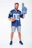 Happy man fan in blue t-shirt standing isolated. royalty free stock photography Happy man fan in blue t-shirt standing isolated. royalty free stock photography