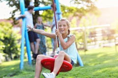 Joyful family having fun on playground royalty free stock photography Joyful family having fun on playground royalty free stock photography