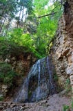 Azure waterfall in the rocks royalty free stock photography Azure waterfall in the rocks royalty free stock photography