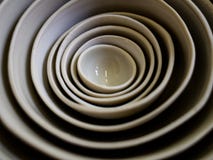 Picture of stacked plates and bowls in soft-focus with a beautiful pattern shoot with a macro-lens. stock photos Picture of stacked plates and bowls in soft-focus with a beautiful pattern shoot with a macro-lens. stock photos