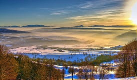 Beautiful foggy mountain landscape at sunset stock photography Beautiful foggy mountain landscape at sunset stock photography