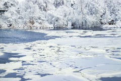 Picturesque winter landscape on the Dnieper River, covered with ice, snow and hoarfrost. View of the river and park in Dnepr city stock photo Picturesque winter landscape on the Dnieper River, covered with ice, snow and hoarfrost. View of the river and park in Dnepr city stock photo