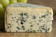 Piece of French Bleu d`auvergne cheese stock images Piece of French Bleu d`auvergne cheese stock images