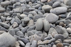 Piedras grises en la playa imagen de archivo Piedras grises en la playa imagen de archivo