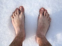 Pieds dans la neige photographie stock Pieds dans la neige photographie stock