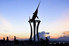 Pier silhouette of swordfish statue at sunset royalty free stock photos Pier silhouette of swordfish statue at sunset royalty free stock photos