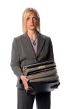 Pila della holding della donna di lavoro di ufficio fotografie stock Pila della holding della donna di lavoro di ufficio fotografie stock