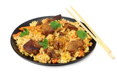pilaf with meat on black plate isolated on white background royalty free stock photography pilaf with meat on black plate isolated on white background royalty free stock photography