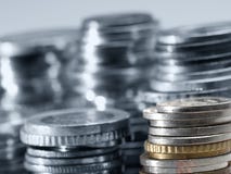 Pilas de monedas del dinero Pilas de monedas del dinero