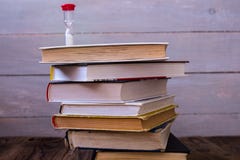 Pile of books and hourglass royalty free stock photo Pile of books and hourglass royalty free stock photo