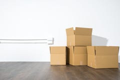 Pile of cardboard boxes on white background with box shadow royalty free stock photography Pile of cardboard boxes on white background with box shadow royalty free stock photography