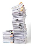 Pile de documents d'isolement sur le blanc Photo stock Pile de documents d'isolement sur le blanc Photo stock