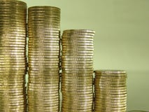 Pile Folded Of Coins In The Form Of Charts Stock Photos