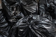 A pile of garbage bags. Trash bags background stock images A pile of garbage bags. Trash bags background stock images