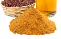 Pile of ground coriander, mustard seeds with oil stock photo Pile of ground coriander, mustard seeds with oil stock photo