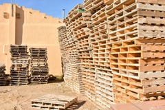 piles of european pallets made in wood ready to be used transporting products or goods on them from a place to other by truck, stock photography piles of european pallets made in wood ready to be used transporting products or goods on them from a place to other by truck, stock photography