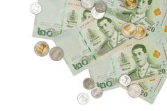 Pilha de 20 cédulas novas e de moedas do baht tailandês imagens de stock royalty free Pilha de 20 cédulas novas e de moedas do baht tailandês imagens de stock royalty free