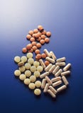 Pills On Blue Royalty Free Stock Photography Pills On Blue Royalty Free Stock Photography