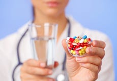 Pills, tablets and drugs heap in doctor hand stock photography Pills, tablets and drugs heap in doctor hand stock photography